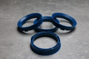 4x SET Zentrierringe Distanzringe 66,6 mm x 57,1 mm blau für Alufelgen - Bild 1 von 1