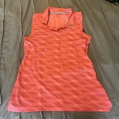 Polo de golf Nike Dri-Fit rosa sin mangas para mujer talla grande Foto 1 de 4
