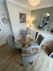 Round glass and oak dining table with four chairs by Next - Picture 1 of 6
