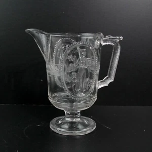 ANTIGUA JARRA RICHARDS & HARTLEY GUARDIAN VENUS Y CUPIDO PATRÓN 32 OZ EAPG 8" - Imagen 1 de 5