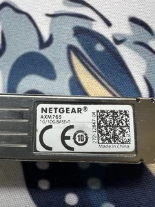 NETGEAR genuine AXM765 SFP+ Transceiver, converts SFP+ ports to copper 10GBase - Picture 1 of 3
