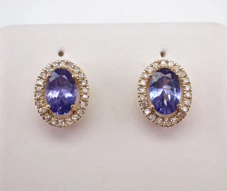 Aretes con halo de tanzanita de corte ovalado de 2,15 quilates enchapados en oro amarillo de 14 quilates Foto 1 de 4
