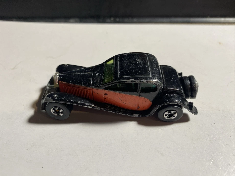 Hot Wheels 37 Bugatti Hong Kong negro con rayas naranjas 1980 Roadster pre-owne Foto 1 de 1