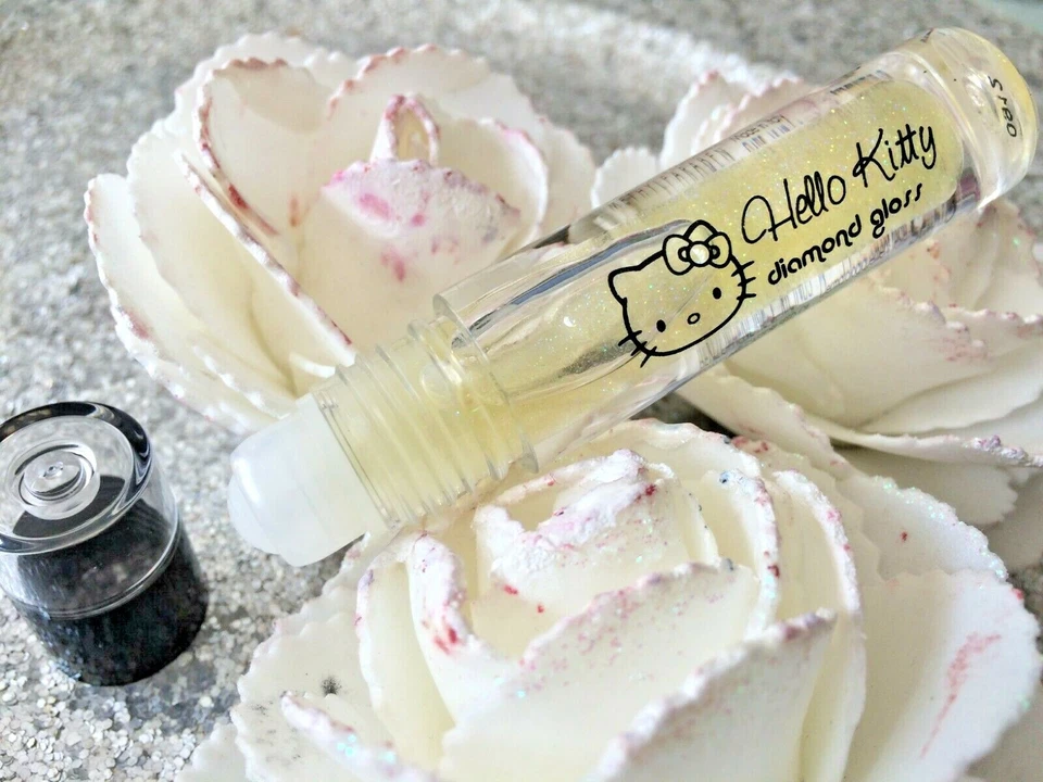 HELLO KITTY Diamante Gloss Al Frutta Rollon Labbra Trasparente Con Neve Cocco - Immagine 1 di 3