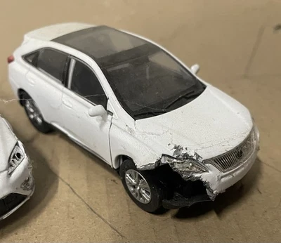 Wrecked WELLY LEXUS RX 450h WHITE 1:34 DIE CAST METAL MODEL - Image 1 of 3
