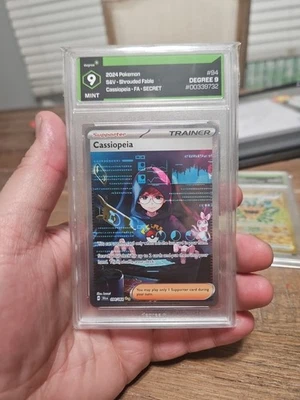2024 Pokémon Trainer Cassiopeia 094/064 FA Secret  Graded 9 Mint - Image 1 of 2