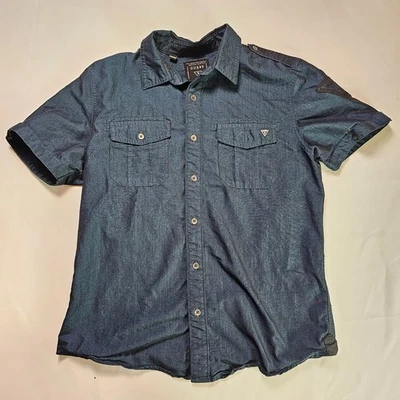 Camisa Guess Denim Look Manga Corta Abotonada Para Hombre Pequeña Azul Parche Logo Informal Foto 1 de 4