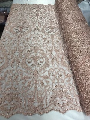 PEACH PRINCESS DESIGN EMBROIDERY WITH HEAVY BEADS ON A MESH-SOLD BY YARD. - Image 1 of 4