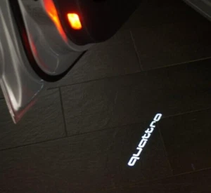 Audi OEM QUATTRO LED Logo Projector Puddle Lamp Pair Most Models Fitment New - Picture 1 of 5