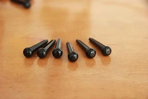 EBONY STEG BRIDGE PIN SET 5.59 mm f. MARTIN GIBSON EBENHOLZ WESTERN DREADNOUGHT - Picture 1 of 2