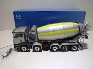 Conrad 71201/0 LIEBHERR HTM 1204 en MAN TGS 5 ejes * PLATA * NUEVO & EMBALAJE ORIGINAL - Imagen 1 de 5