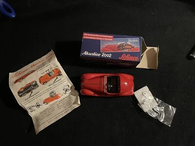 Schuco Akustico 2002 réplica de coche de juguete mecánico hecho en Alemania Occidental Foto 1 de 4