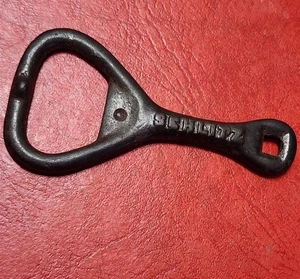 VINTAGE RARE CAST IRON SCHLITZ BEER BOTTLE OPENER 2-7/8" - Picture 1 of 2