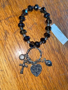 ^BRACELET SILVER TONED BLACK BEADED 4 different CHARMS(2 with clear stones) NWT - Picture 1 of 2