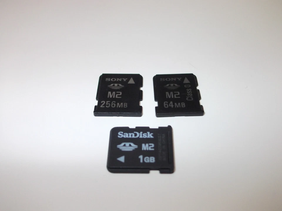 3x Sandisk 1GB Sony 256MB , 64MB M2 Memory Card - Joblot - Image 1 of 1