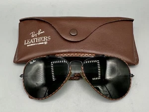 Occhiali da sole vintage B&L Ray Ban USA pelle aviatore 58 mm montatura nera e custodia orig - Foto 1 di 19