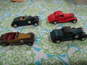 Spielzeugautos 4 Stück 4 Zoll ca. 1:43, Matchbox, Yatming, 1/38 ? - Bild 1 von 3