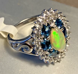 Anillo redondo de ópalo etíope circonita cúbica y topacio azul talla 9 plata de dirección .925 JTV - Imagen 1 de 4