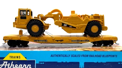 HO ATHEARN 1492 50' FLAT CAR TTX # 140192 WITH NORSCOT CAT SCRAPER 627G - Image 1 of 2