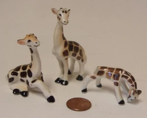 Lot de 3 mini figurines girafe en céramique - Photo 1/16