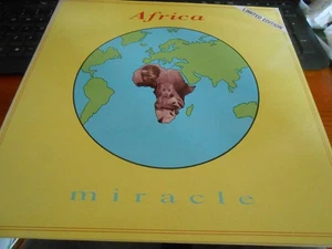 Miracle - "Africa / Eritrea / Africa (Backing Track)" - ROUND 12" Single - Picture 1 of 6