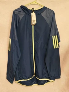 Adidas Windjacke Herren Größe L blau mit grünem Besatz durchgehende Reißverschlusstaschen - Bild 1 von 16
