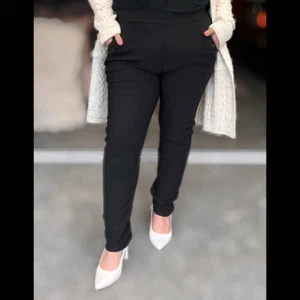 PANTALONES ELÁSTICOS DE MUJER SEÑORA TALLA GRANDE NEGROS LISOS CON BOLSILLOS CON BOTONES - Imagen 1 de 5