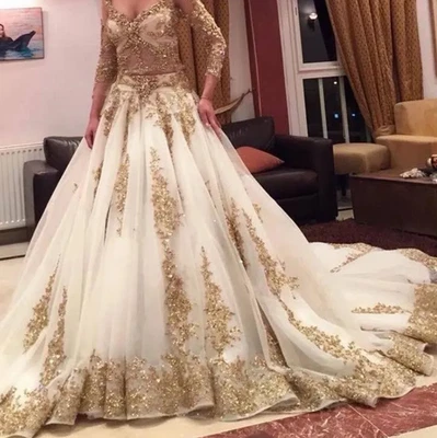 Luxury Indian White Wedding Dresses with Gold Applique Deep V-Neck Long Sleeves - Image 1 of 4