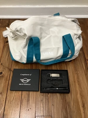 Bolso de lona Mini Cooper blanco y verde azulado para pasar la noche marcas de equipaje en mala lectura Foto 1 de 4