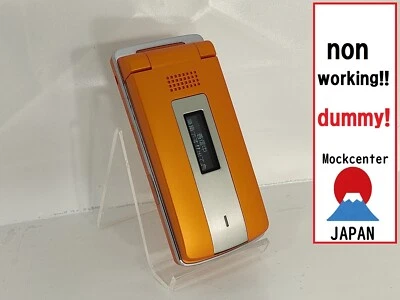 【dummy!】 SHARP SH702is（color orange） docomo-japan non-working cellphone - Image 1 of 3