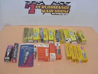 Assortment of NEW Spark Plugs, Accel, Champion, AC Delco, Autolite, NGK Foto 1 de 4