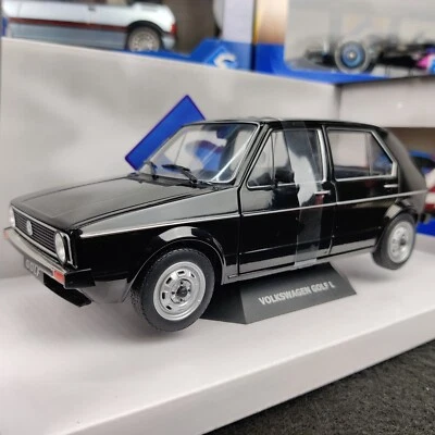 AUTO SOLIDA VOLKSWAGEN GOLF L BLACK 1983 1:18 NUOVA SCATOLA S1800209 - Immagine 1 di 4