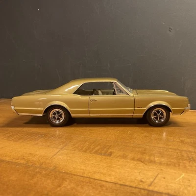 Highway 61 1/18 Scale 1967 Gold Olds 442 Diecast - Image 1 of 4