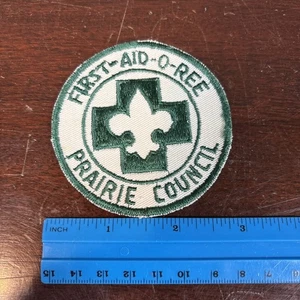 Parche B.S.A~ First-Aid-O-Ree Prairie Council~años 50 - Imagen 1 de 2