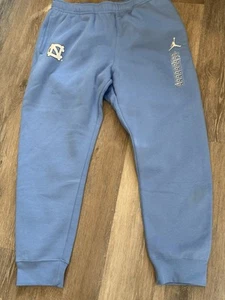Jordan Jump man Nike UNC Tar Heel Sweatpants Men’s Size Large Blue On Field NWT - Picture 1 of 12