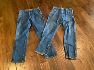 2 pares de jeans Wrangler Riggs ropa de trabajo FR 38x36 FR3W050 resistentes al fuego lavado medio - Imagen 1 de 9
