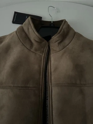 Cuero de cabra hombre talla pequeña Foto 1 de 4