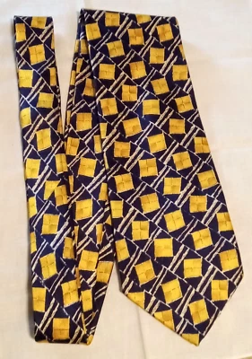 Corbata de seda para hombre UNGARO Paris azul oscuro/amarillo estrellas hecha en Italia Foto 1 de 4