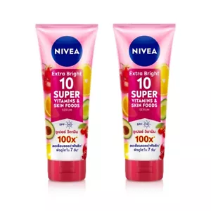 2x320ml Extra Bright Nivea Body Lotion Vitamins 10 Super Skin Food Serum SPF15 - Picture 1 of 8