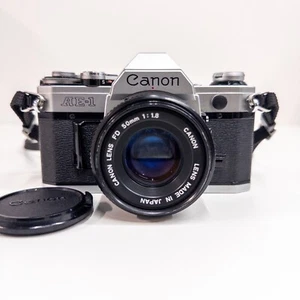 Canon AE-1 SLR 35mm Film Camera Silver w/50mm 1.8 Lens good Condition Tested - Picture 1 of 6