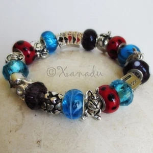 Bracciale Alice nel Paese delle Meraviglie Charm Europeo con Perline Turchese, Rosso, Viola - Foto 1 di 6