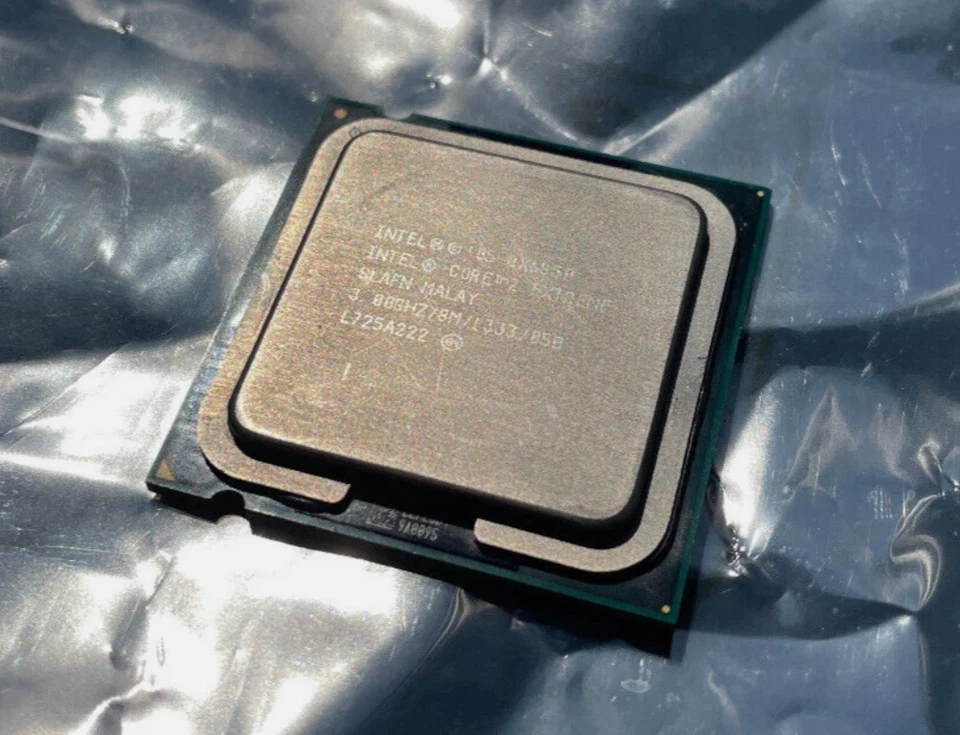 CPU Intel Core 2 Extreme QX6850 3,00 GHz 8 MB 1333 Mhz FSB SLAFN G0 LGA775 #41 Foto 1 de 1