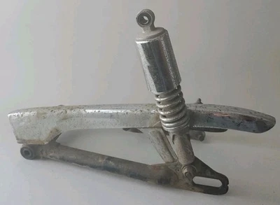 Suzuki T350 1971 basculante chainguard T 350 rebel protector de cadena brazo oscilante amortiguador Foto 1 de 4