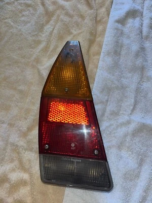 OEM Volkswagen Audi 74-81 Dasher Fox WAGON LEFT TAILLIGHT ASSEMBLY SMALL CRACK - Image 1 of 4