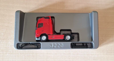 Herpa 313377 VOLVO FH GL trattore stradale neutro rosso OVP 1:87 - Immagine 1 di 4