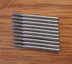 10 BROCAS DE PUNTA DE RUEDA DREMEL DIAMOND NUEVAS #7144 1/8" VÁSTAGO 3/32" CABEZA DE REBABAS - Imagen 1 de 10