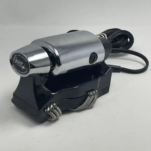 Masajeador vibratorio de mano Oster Stim U Lax 103-10E para espalda hombros y manos - Imagen 1 de 10