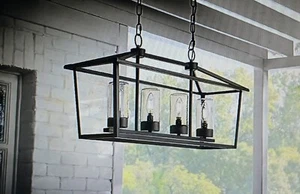 Jill 4-Light Textured Black Linear Chandelier  Weather Zinc Clear Seedy Glass - Picture 1 of 7