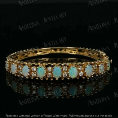 Stunning 7 Ct Simulated Fire Opal Tennis Bangle Bracelet 14K Yellow Gold Finish - Image 1 of 4