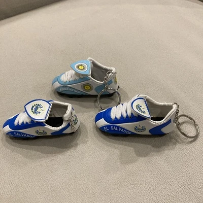 Mini Soccer Shoe Keychains – Argentina & El Salvador – World Cup Fan Souvenirs - Image 1 of 4